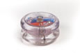 A yo-yo with two clear surfaces.