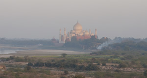 Hazy view across low plains to a large ornate building Hazy view across low plains to a large ornate building