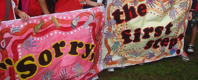 Banners reading 'Sorry, the first step', displayed by children at the Redfern Community Centre after watching the live telecast of the formal Apology to the Stolen Generations, 2008.