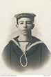 Studio portrait of a young man wearing a sailors uniform.